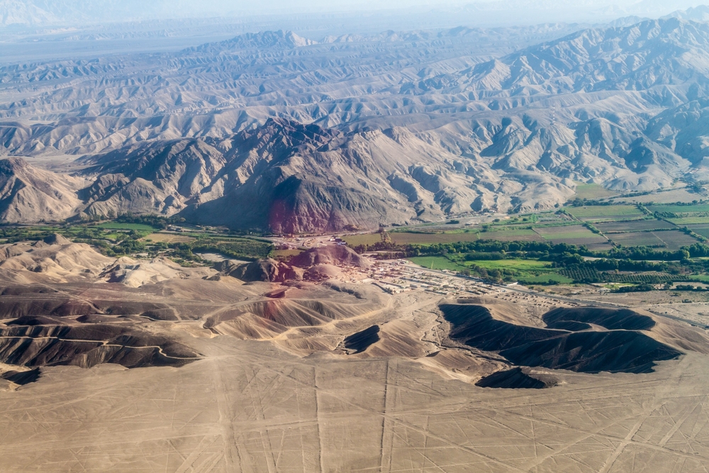 Aerial view of a valley near Nazca, Peru. The famous Nazca Lines are visible as well. 