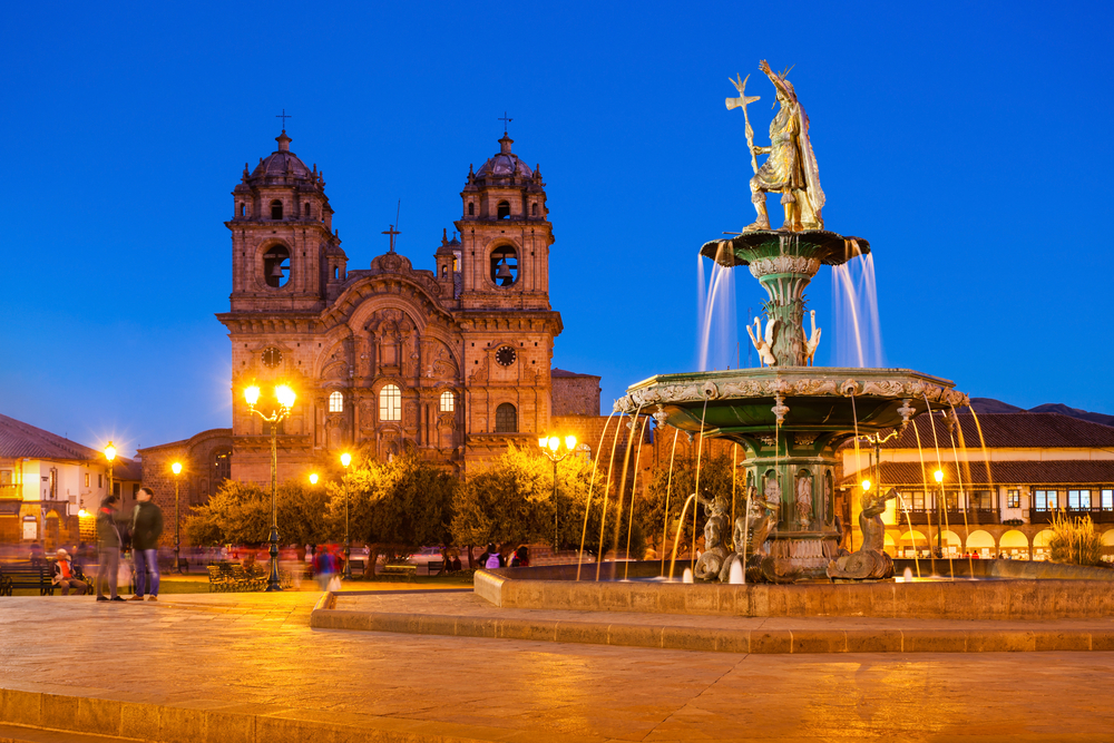 Fountain at Plaza de Armas in Cusco at sunset
