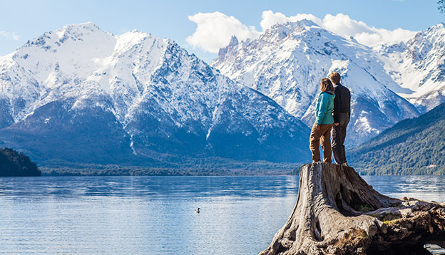 A couple admiring some very scenic views outside Bariloche, Patagonia, Argentina.
