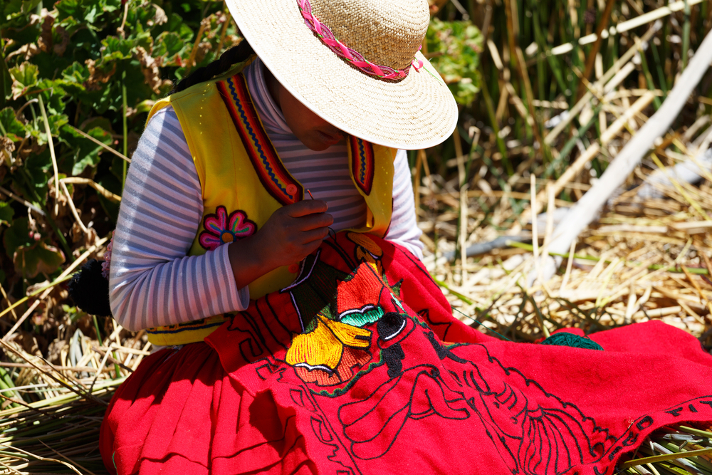 Woman in traditional clothes in Puno, Peru