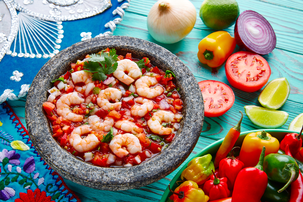 colourful image of food. with prawns, tomatoes and capsicum