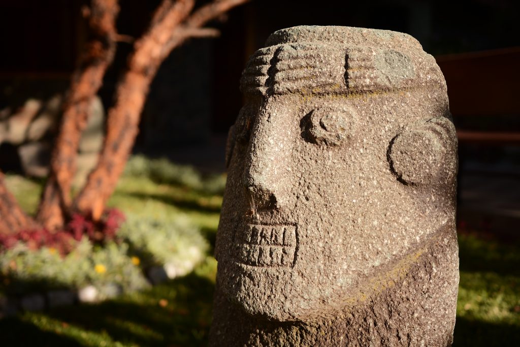 head sculpture outdoors in Cusco Peru