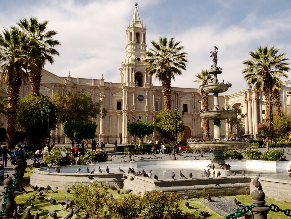 plaza in peru with spanish colonial architecture