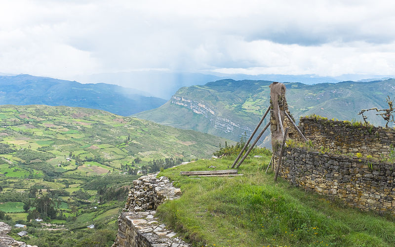 view from the kualap fortress in peru over mountains and green fields