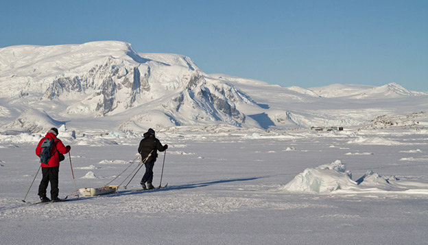 People ski in Antarctica