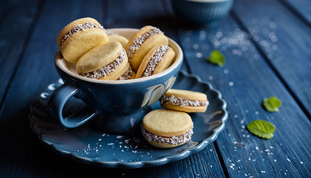 Alfajores - traditional sandwich cookies filled with caramelized milk and coconut
