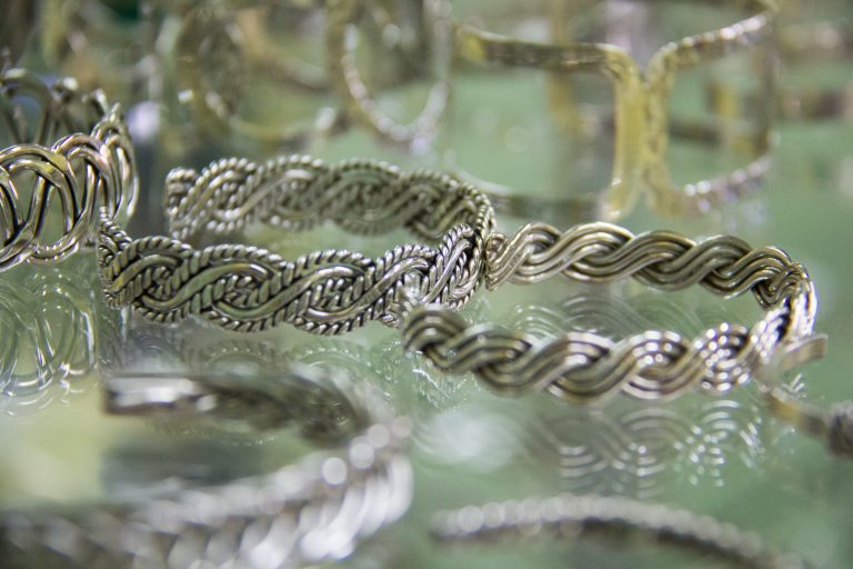 Silver bracelets on sale in a Mexican jewelry store credit shutterstock