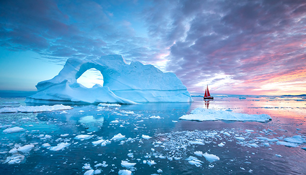 A Sail boat provides perspective in the Arctic