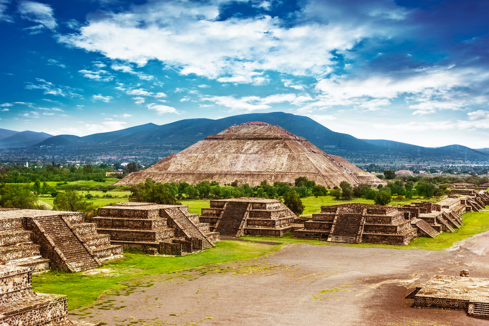 The Teotihuacan Pyramids; ancient pyramids with mountains in background