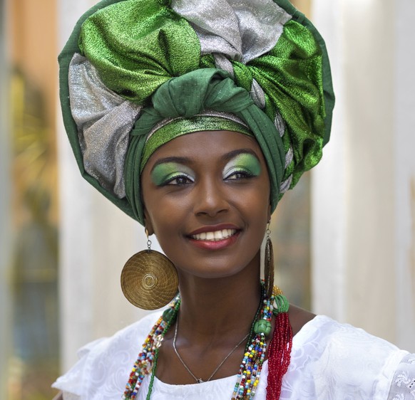 Brazilian woman of African culture, smiling.