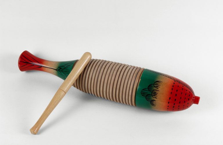 a guiro, percussion musical instrument credit shutterstock