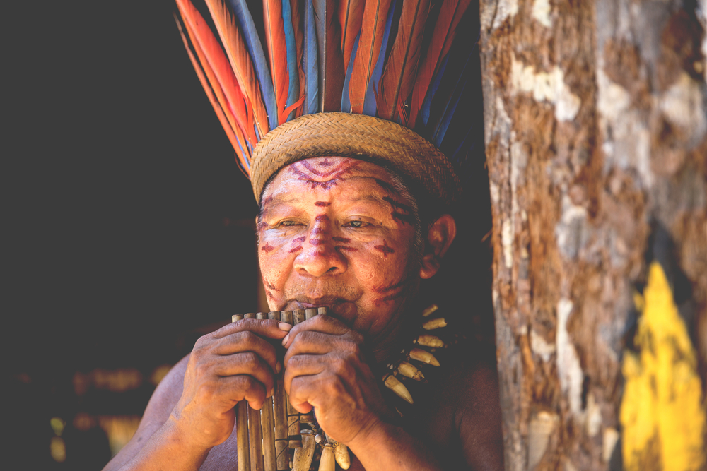 Native Brazilian man at an indigenous tribe in the Amazon.