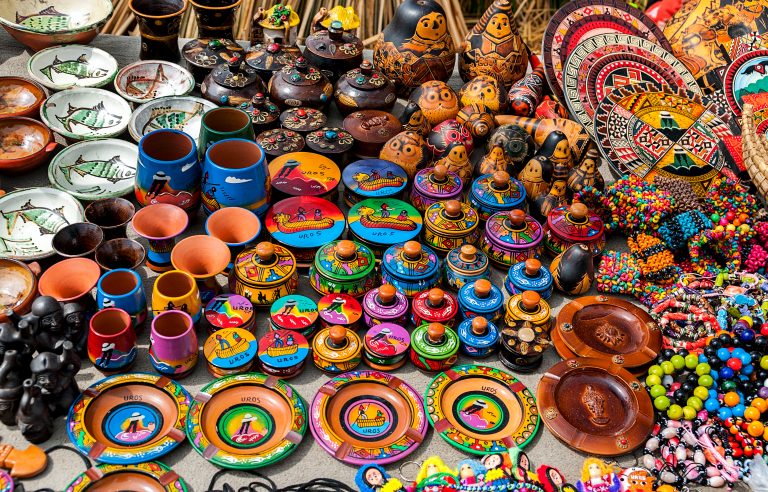 Peruvian souvenirs and toys on the market credit shutterstock